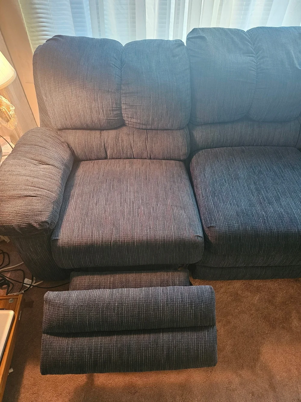 Blue Two Piece Sectional Sleeper With Right End Manual Recliner.